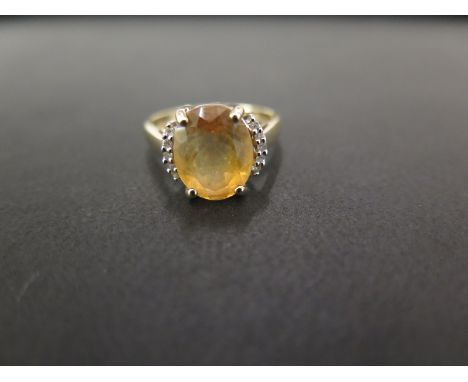 A 9ct gold citrine and diamond dress ring - Hallmarked Birmingham - Ring size N - Weight approx 2.5gms
Condition Report: Good