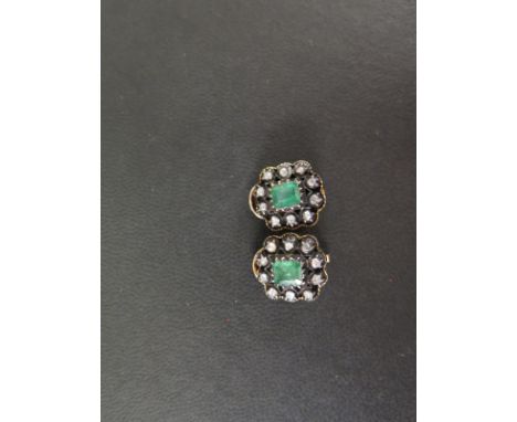 A pair of emerald and diamond cluster ear clips - Each designed as an octagonal emerald within a rose-cut diamond surround - 