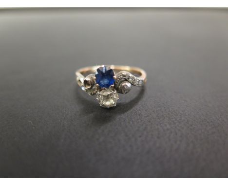 An early to mid 20th century gold sapphire and diamond dress ring - The old-cut diamond and circular-shape sapphire to the ol