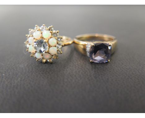 A 9ct gold amethyst and diamond ring - Size N - Together with an opal and white-gem cluster ring - Size O - Both hallmarked B