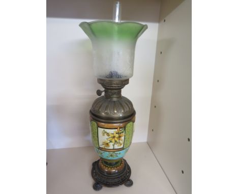 A late Victorian stoneware oil lamp with a brass base and font with green tinted etched shade - Height to shade 55cm 
Conditi