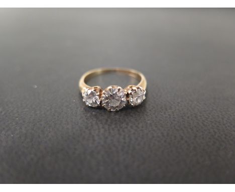 An early 20th century transitional-cut diamond graduated three-stone ring - estimated total diamond weight 1.30cts - Estimate