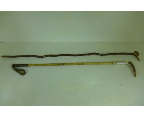 A Riding Crop with hallmarked silver band, London 1902 and a bone handled walking stick 
Condition report: Good 