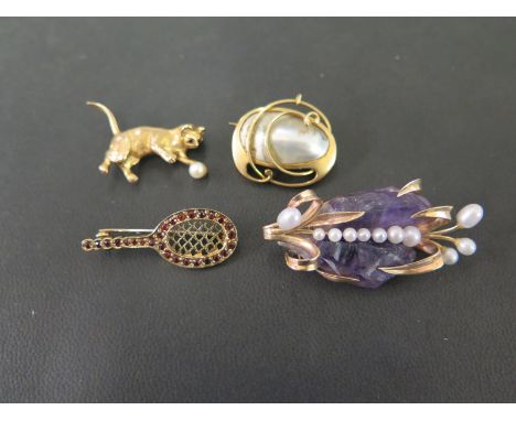 Four brooches - To include a cat, a tennis racket, an amethyst crystal with imitation pearls - together with a mabe pearl - A