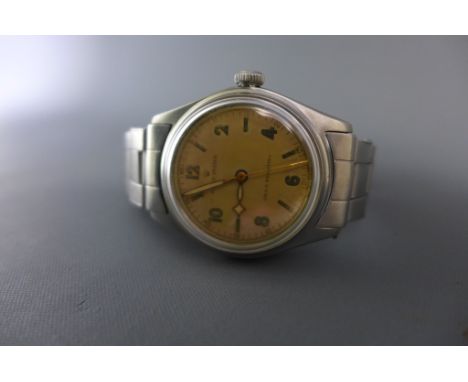 A good late 1940's Rolex Oyster medium size stainless steel wristwatch having faded metallic dial with lume applied stick and