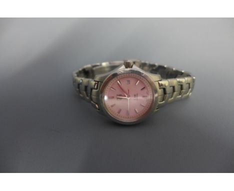 A Ladies Tag Heuer Link Lady wristwatch model WJF1312 having pink mother of pearl dial with applied stick markers and pencil 