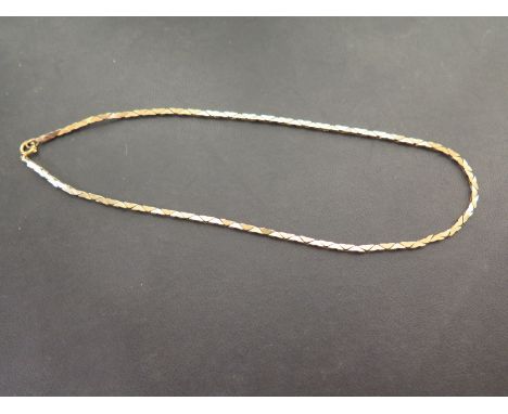 A 9ct gold articulated panel necklace - Hallmarked London - Length approx 42cms - Weight approx 14.0gms
Condition Report: Goo