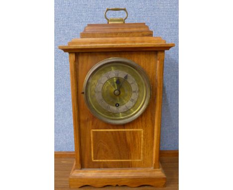 An inlaid beech bracket clock, with fusee movement and fine adjustment pendulum