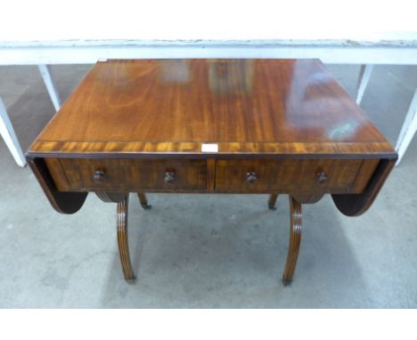 A Regency style mahogany sofa table