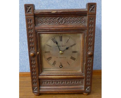 A 19th Century oak mantel clock, the dial signed Alfred Mason, Gt. Yarmouth, with W&H movement