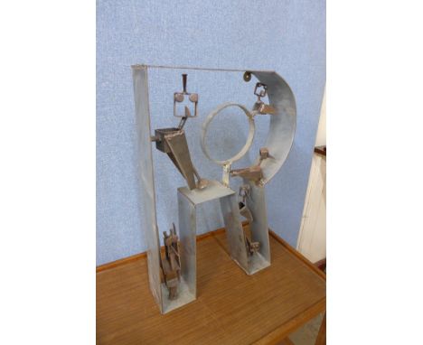 A hand welded metalwork letter R