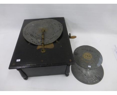 A windup late 19th/ early 20th Century polyphon complete with three metal discs: Lead Kindly Light, There is a Green Hill  Fa