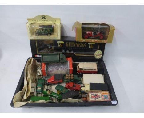 A box of assorted die-cast including a Corgi Guinness tractor and trailer.