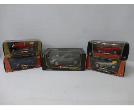 Five boxed Burago die castmodels: Ferrari 550 Maranello (1996), Mercedes-Benz SSK 1928, BMW M Roadster, Mini Cooper and a Bug