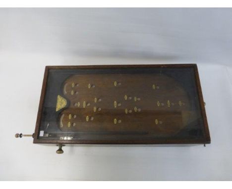 An early 20th Century amusement oak cased bagatelle.
