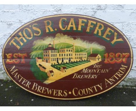 A Tho's R. Caffrey Master Brewers oval painted wooden sign, 35 1/2 x 23 1/2".