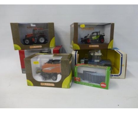A box of assorted farming die cast, including 3 Universal Hobbies, Ertl Ford 4-wheel drive tractor, Massey Ferguson.