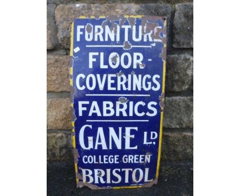 A Gane Ltd of Bristol Furniture, Floor Coverings and Fabrics' enamel sign 12 x 24".