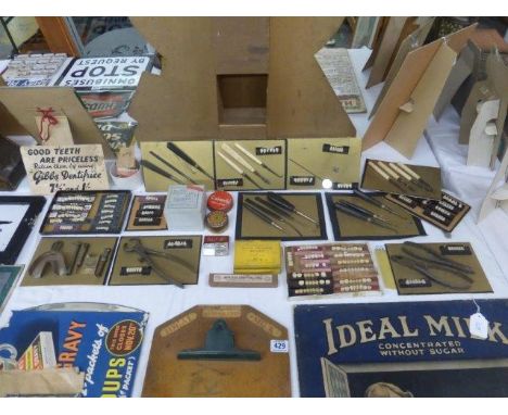 Yesterday's World Museum Pharmacy - a selection of dentist's tools and various groups of teeth mounted on display cards.