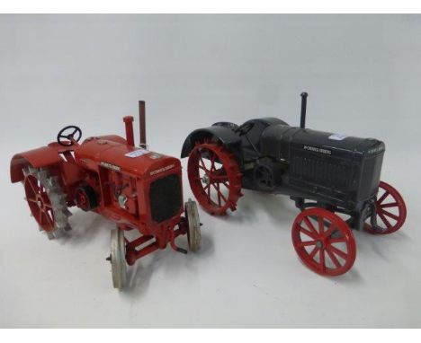 A die-cast model special edition 1996 McCormick Deering W.30 tractor and a model of a Dyersville Iowa McCormick 15-30 tractor