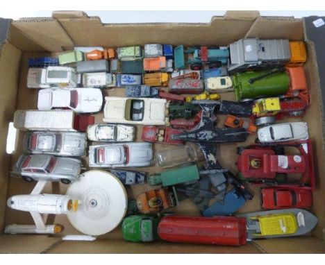 A box of assorted play worn die cast models, including a U.S.S. Enterprise 1976, Dinky Trident Starfighter, Lone Star -petrol