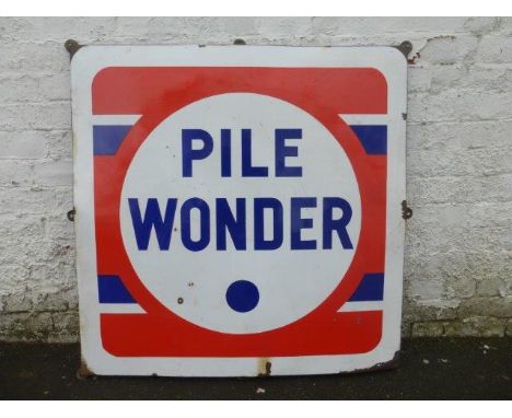 A Pile Wonder enamel sign, 38 x 38 1/2".