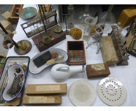 A collection of chemist/ laboratory apparatus including scales, test tube rack, enamel ware etc.