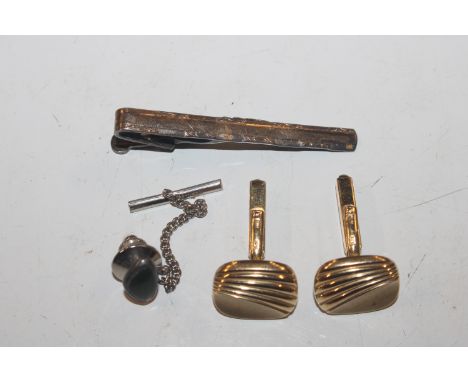 A pair of 9ct gold cuff-links, approx. total weight 7gms; a gold on silver tie clip etc.