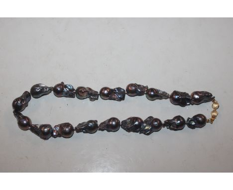 A large blister pearl necklace 
