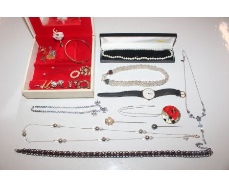 Three boxes containing simulated pearl necklace, wrist watch, various other necklaces, ear-rings, a 9ct gold bangle with meta