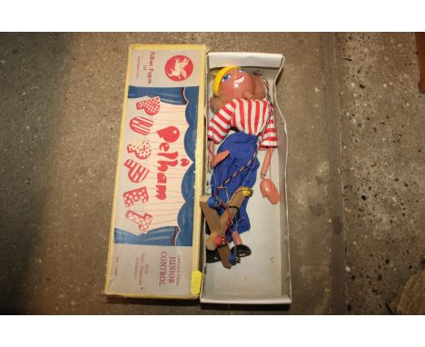 A boxed Pelham puppet 