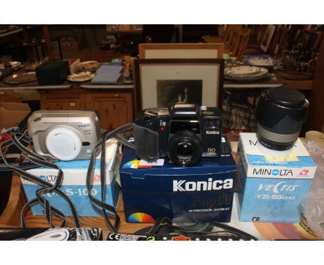 A Konica Z-UP80 camera and a Minolta camera body and a Minolta zoom lens