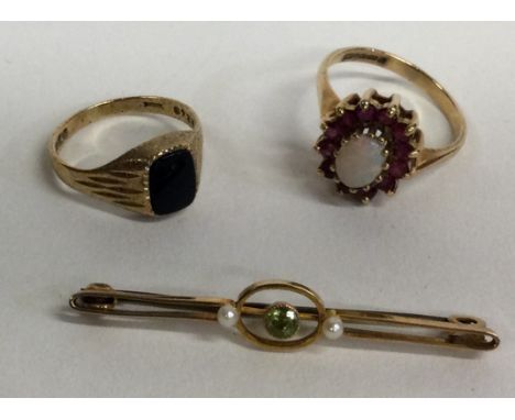 A 9 carat opal cluster ring together with a pearl and peridot bar brooch etc. Approx. 6 grams. Est. £80 - £120.