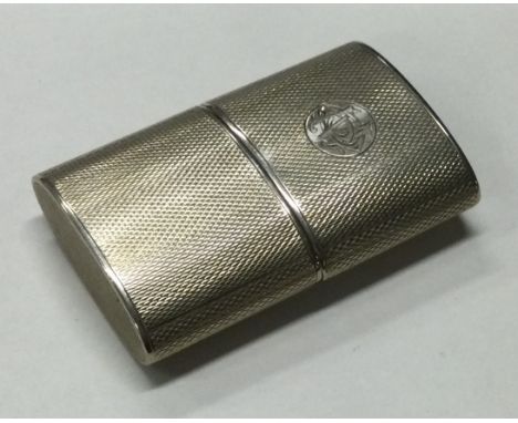 An engine turned silver lighter. Approx. 38 grams. Est. £40 - £60.