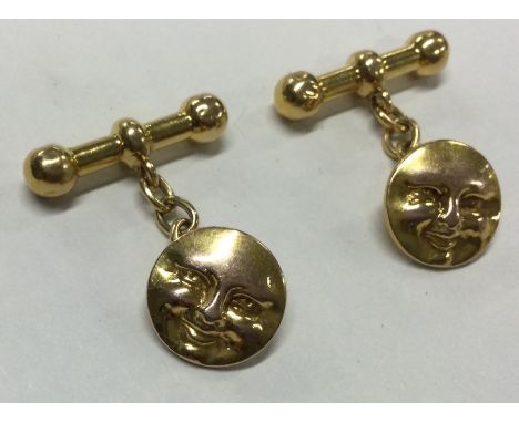 A good pair of 18 carat gold 'man on the moon' cufflinks contained in fitted box. Approx. 9 grams. Est. £350 - £400.