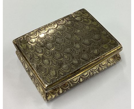 An 18th Century silver snuff box engraved with shells. Maker's mark only to interior. Approx. 74 grams. Est. £300 - £400.