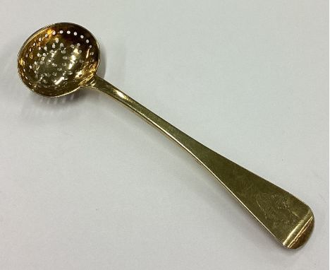 A rare silver gilt pierced toddy ladle. London 1810. Approx. 13 grams. Est. £20 - £30.