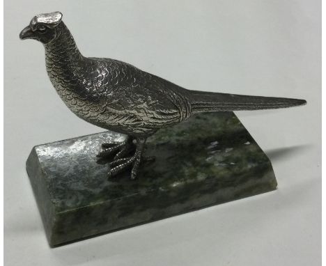 An early 20th Century silver cast model of a pheasant bearing Berthold Muller import marks. Approx. 412 grams of gross weight
