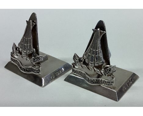 A rare pair of Victorian silver menu holders. London 1896. By William Hutton & Sons. Approx. 80 grams. Est. £150 - £200.