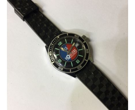 LES ROUTIERS: A gent's stainless steel diver's wristwatch decorated with red and blue face and black enamel bezel and rubber 