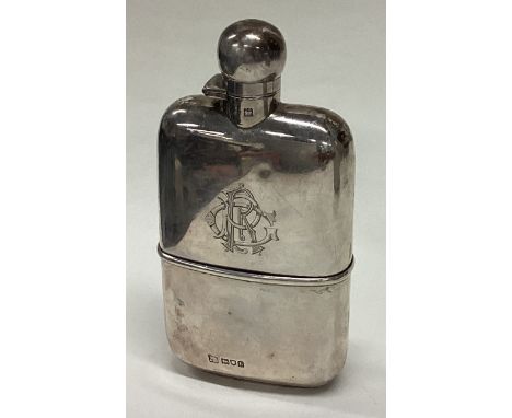 A good quality silver hip flask with detachable base to hinged lid. London. By SM&Co. Approx. 142 grams. Est. £150 - £200.