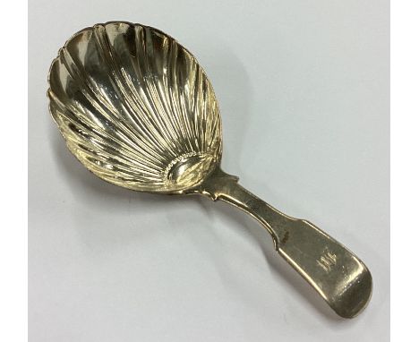 A heavy William IV silver fluted caddy spoon. London 1835. By William Knight. Approx. 21 grams. Est. £50 - £80.