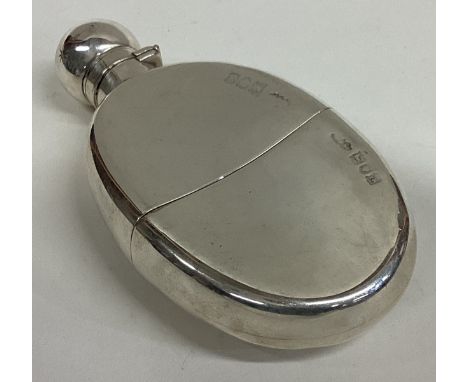 A Victorian silver flask with detachable cover. London 1896. Approx. 147 grams. Est. £200 - £300.