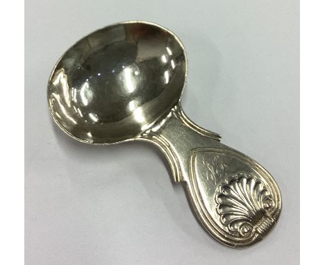 An unusual George III silver caddy spoon with shell decoration to handle. Birmingham 1822. By Joseph Willmore. Approx. 24 gra