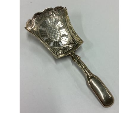 A George III silver bright-cut caddy spoon with pierced decoration. Birmingham 1814. By John Taylor. Approx. 8 grams. Est. £6