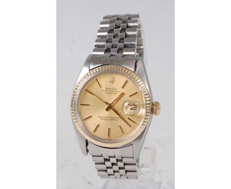 A gents bi-metal Rolex Oyster Perpetual datejust superlative chronometer, having signed champagne dial with baton markers, gi
