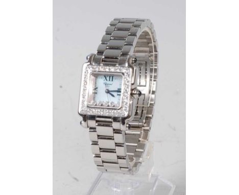 A lady's Chopard Happy Sport stainless steel bracelet watch, with signed mother of pearl dial, five floating diamonds, furthe