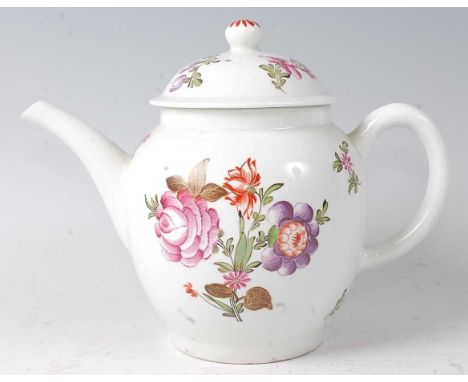 A Lowestoft porcelain teapot and cover, circa 1775-80, polychrome decorated in the Famille Rose palette with floral sprays by