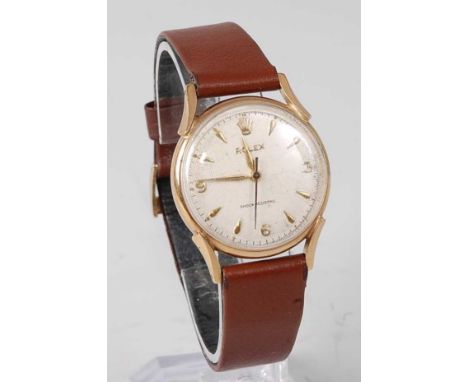 A vintage gents 9ct gold cased Rolex wristwatch, circa 1960, having a signed silvered dial with quarter Arabic numerals, manu