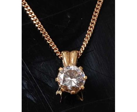 A yellow metal diamond single stone pendant, comprising a round brilliant cut diamond in an eight-claw setting, with solid ba